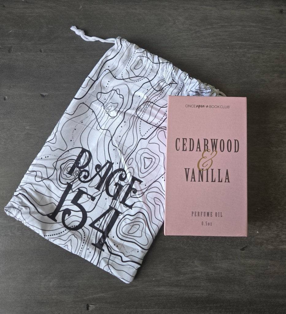 upwrapping gift #2 from once upon a book club’s romantasy box featuring The South Wind by Alexandria Warwick