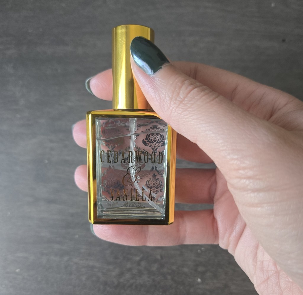 upwrapping gift #2 from once upon a book club’s romantasy box featuring The South Wind by Alexandria Warwick