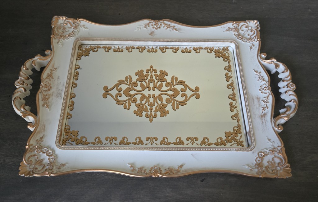 upwrapping gift #3 from once upon a book club’s romantasy box featuring The South Wind by Alexandria Warwick